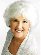 Portrait de Barbara Coloroso, souriante.