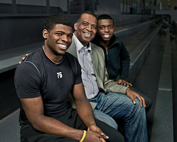 Photo of Karl Subban with Montreal Canadiens defenceman P.K. Subban and Boston Bruins goaltender Malcolm Subban.