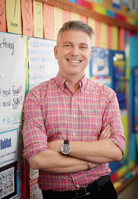 Photo of College Registrar Michael Salvatori smiling.