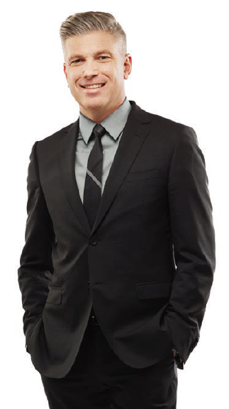 Photo of College Registrar Michael Salvatori smiling.