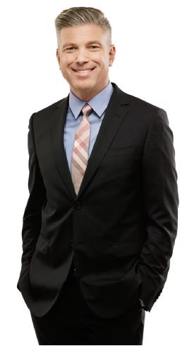 Photo of College Registrar Michael Salvatori smiling.
