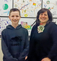 Photo of student artist Andrew Stevenson and teacher Diana Hatzepetros-Middleton.
