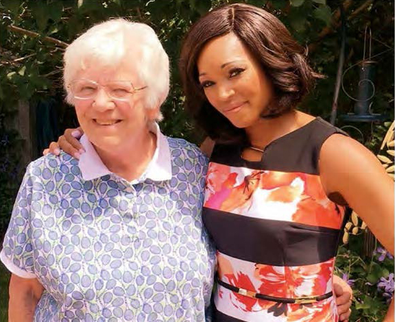 Tracy Moore standing with her arm around her former teacher, Anne Houlding