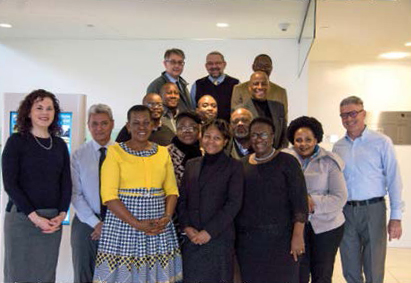 Photo of an international delegations of educators from Brazil pictured with College Chair Angela De Palma.