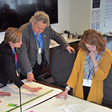 Photo of a group of educators working on a project.