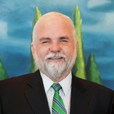 Photo of Gary Rabbior, the president of the Canadian Foundation for Economic Education, smiling.